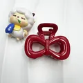 Pinza para el pelo roja brillante con forma de lazo para peinados elegantes de mujer - Pajarita