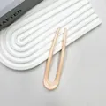 Eleganter beiger U-förmiger Haarstab in Aprikose mit minimalistischem Glanzdesign - Rosa Orange