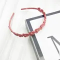 Cerchietto rosa opaco per donna con dolce decorazione di petali di margherita - Rosa