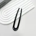 Sleek black U-shaped hair pin with minimalist double-tooth design for elegant styling - Black