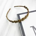 Cerchietto per capelli giallo senape opaco con fiori e denti antiscivolo - Cachi