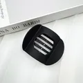 Flat matte black hair clip for elegant buns and half-up styles on textured tray - Rubber Paint Black