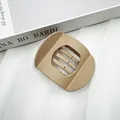 Flat round matte khaki hair claw clip with parallel hollow stripes for women - Matte Light Khaki