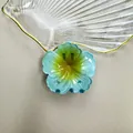 Molla per capelli a fiore con sfumatura blu e ambra in vetro dal design elegante - Blu Sfumato