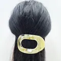 Pince à cheveux ovale plate motif marbre écaille de tortue sur cheveux noirs - Faux Marbre Jaune-brun