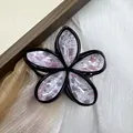 Frangipani hair claw clip with pink and purple ink marbling and black glossy outlines - Peach with Ink Splatter