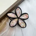 Tropical frangipani hair claw clip with black frame and pink marble pattern - Orange with Ink Splatter