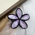 Elegant purple and pink marbled flower hair claw clip with black outline and glossy finish - Pink Green with Ink Splatter
