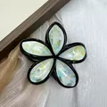 Frangipani hair claw clip with colorful ink-wash pattern and elegant black edges - Green with Ink Splatter