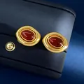 Vintage gold geometric earrings with drop-shaped red gemstone on blue velvet - Stud Earrings / Gold Red Agate Earrings