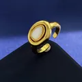 Adjustable gold-plated ring featuring an oval white mother-of-pearl gemstone inlay - Gold White Shell Ring