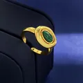 Vintage style gold adjustable ring featuring a teardrop-shaped green malachite stone - Gold Malachite Ring