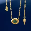 Golden necklace with oval malachite pendant in a vintage geometric palace style - Gold Malachite Necklace