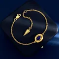 Golden geometric bracelet with an oval blue lapis lazuli stone and a sleek lobster clasp - Gold Lapis Lazuli Bracelet