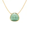 Minimalist gold necklace with a triangular green gemstone pendant on white background - Jade Stone Necklace
