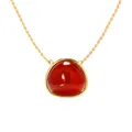 Elegant gold titanium steel necklace featuring a polished triangular red agate pendant - Red Agate Necklace