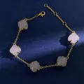 Detail of five cushion-cut pink crystals on a delicate gold chain bracelet with lobster clasp - Gold (Pink + Clear)