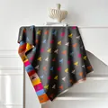 Thick grey cashmere-like scarf with colorful bee patterns and striped tassels for women - 185x65cm / Gray