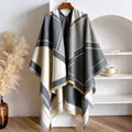 Geometric color-block shawl poncho with fringe detail in gray and beige tones - Gray