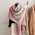 Detailed view of pleated patchwork shawl in pink and grey tones on a minimalist hanger - 190x60cm / Pink