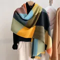 Detail of pleated knit shawl with geometric color blocks and accordion texture - 190x60cm / Orange