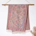 Detail of bohemian paisley shawl with tassel fringe hanging on a wooden wall rack - Bxs-204 Pink / 200x65cm