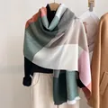 Detail of color-blocked pleated scarf showing soft textured knit fabric and rich drape - 190x60cm / Dark Green