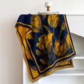 Close-up of tulip floral pattern on a thick blue and yellow cashmere-feel winter scarf - 185x65cm / Yellow Blue