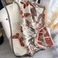 Floral pashmina shawl in beige with brown butterfly patterns and fringed edges - 185x65cm / Beige Brown