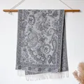 Grey paisley jacquard shawl with white fringe details hanging on a wooden rod - Bxs-206 Gray / 200x65cm