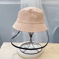 Pink protective bucket hat for kids with clear anti-droplet shield on a stand - 48-52CM Age 1-7 / Pink