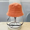 Kids orange cotton protective bucket hat with a clear full-face transparent shield - 48-52CM Age 1-7 / Orange