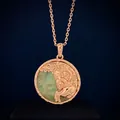 Macro detail of Aries zodiac relief pendant with semi-precious stone in rose gold - Capricorn