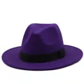 Detail of classic purple wool fedora hat with elegant black decorative ribbon band - Deep purple
