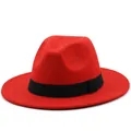 Detailed view of a bright red fedora hat featuring a classic black ribbed ribbon band - Orange Red