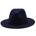 Detail view of a navy blue wool fedora hat featuring a classic black decorative ribbon - Navy Blue