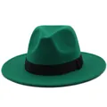 Detail view of the dark green felt fedora hat with a flat brim and black ribbon band - Grass Green