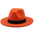 Close-up of a bright orange wool felt fedora featuring a wide black grosgrain ribbon band - Orange