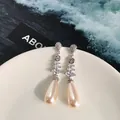 Orecchini pendenti argento con zirconi marquise e perle a goccia eleganti - Argento + Champagne