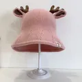Pink knitted baby sun hat with cute deer antlers and ears on a white background - Infant One Size / Pink