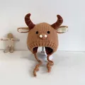 Brown knitted baby hat with cute ox horns and animal features for autumn and winter warmth - 46-48cm / Coffee
