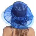Detail of elegant royal blue organza sun hat with oversized brim and floral decoration - M (56-58cm) / Blue