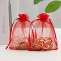 Red organza drawstring gift pouch for jewelry packaging with elegant satin ribbons - Red