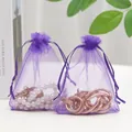 Purple organza drawstring pouch for jewelry and gifts with semi-transparent mesh texture - Deep purple