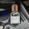 Car aromatherapy bottle with wood grain lid and transparent glass in cup holder - Car Encounter