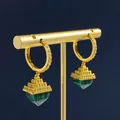 Golden pyramid earrings with emerald malachite and zircon crystals on display - Malachite Pyramid Pendant Earrings / Gold