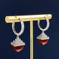Elegant gold pyramid earrings featuring sparkling white zircon and a red heart gemstone - Red Agate Pyramid Pendant Earrings / Silver