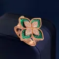 Detailed close-up of rose gold flower ring with malachite stone and pave diamonds - Rose Gold Malachite Style