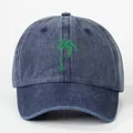 Navy blue cotton baseball cap with green palm tree embroidery and curved brim - One Size / Navy Blue
