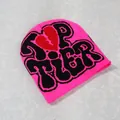 Detailed knit texture of hot pink Y2K beanie with Top Tier letters and heart design - Deep Pink
